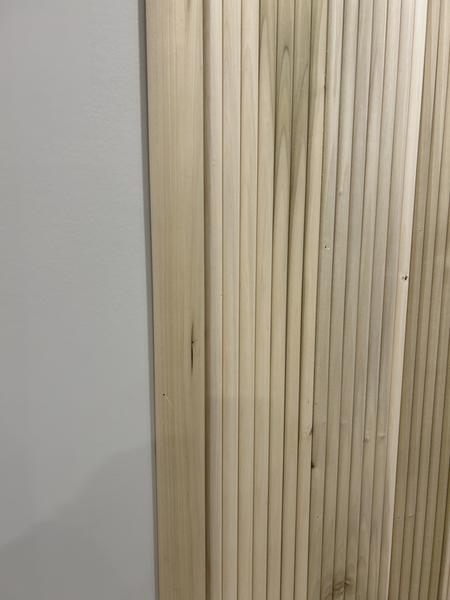 Raw wood fluted panel before paint